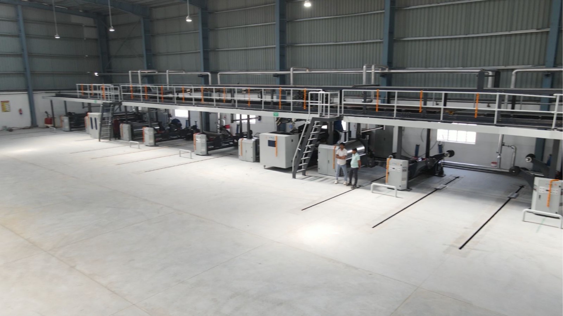 Paper reels stored on the Realage Packaging production floor